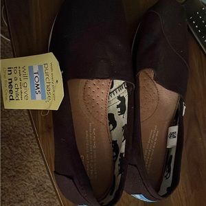 NWT Tom’s Black Slip Ons